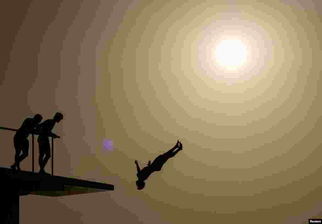 A person jumps into the Adriatic Sea as temperature rises in Zadar, Croatia, July 13, 2024.