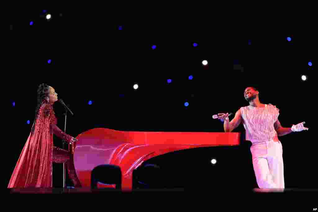 Alicia Keys, left, and Usher perform during halftime of the NFL Super Bowl 58 football game between the San Francisco 49ers and the Kansas City Chiefs, Feb. 11, 2024, in Las Vegas, Nevada.