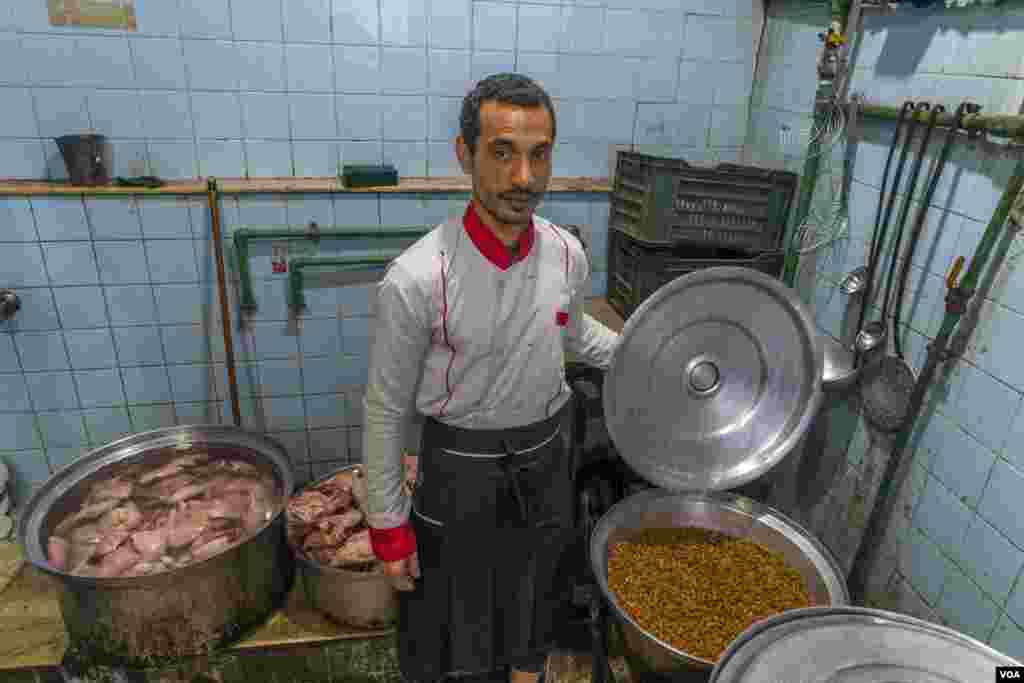 Ahmed, a chef and charity iftar volunteer, is seen in Cairo, March 26, 2023. "We're only cooking pasta because the price of rice is so high, and there wouldn't be enough servings for those in need," Ahmed says. (Hamada Elrasam/VOA) 