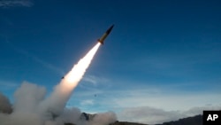 FILE - U.S. Army soldiers conduct testing of early versions of the Army Tactical Missile System in New Mexico, on Dec. 14, 2021. The U.S. has provided the weapons to Ukraine, nearly doubling the striking distance of Ukraine’s missiles. (John Hamilton/U.S. Army via AP)