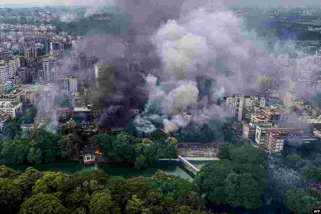 This aerial photo shows anti-government protesters set fire at Bangabandhu memorial museum's Dhanmondi locality in Dhaka, Aug. 5, 2024. 