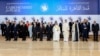 Participants of the Cairo Summit for Peace for a photo just outside Cairo, Oct. 21, 2023. (Egyptian Presidency Media Office via AP)