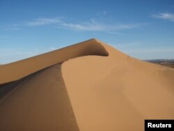 A view of the Lala Lallia star dune of the Sahara Desert, in Erg Chebbi, Morocco, as seen in an undated handout image from 2008 and obtained by Reuters on March 1, 2024. (Charlie Bristow/Handout via REUTERS)