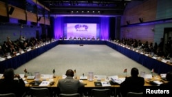 Representatives from various African nations gather at the opening session at the AGOA Forum during the US-Africa Leaders Summit in Washington August 4, 2014. REUTERS/Gary Cameron (UNITED STATES - Tags: POLITICS BUSINESS) - RTR416GJ