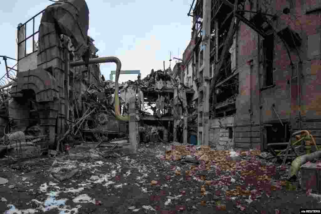 A thermal power plant is destroyed by shelling in the town of Okhtyrka, in the Sumy region, March 14, 2022.