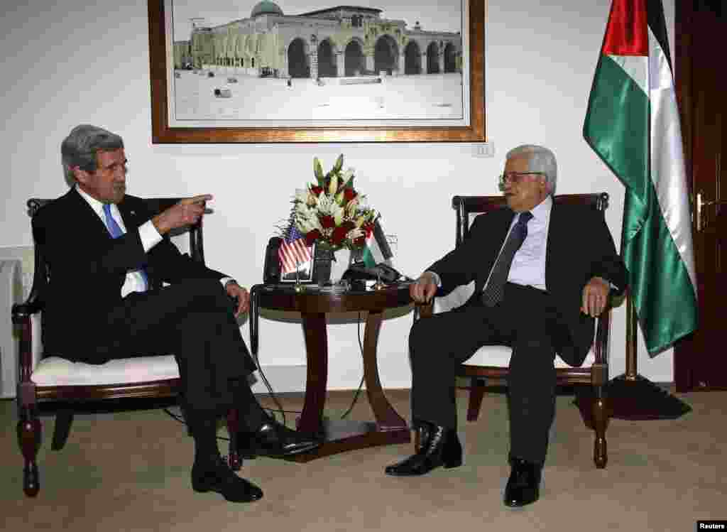 Palestinian President Mahmoud Abbas meets with U.S. Secretary of State John Kerry in the West Bank city of Ramallah, April 7, 2013.