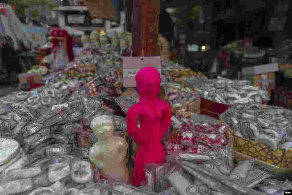These sugary holiday treats, often shaped like dolls or horses, are popular gifts for children in Cairo, Oct. 8, 2022. (Hamada Elrasam/VOA)