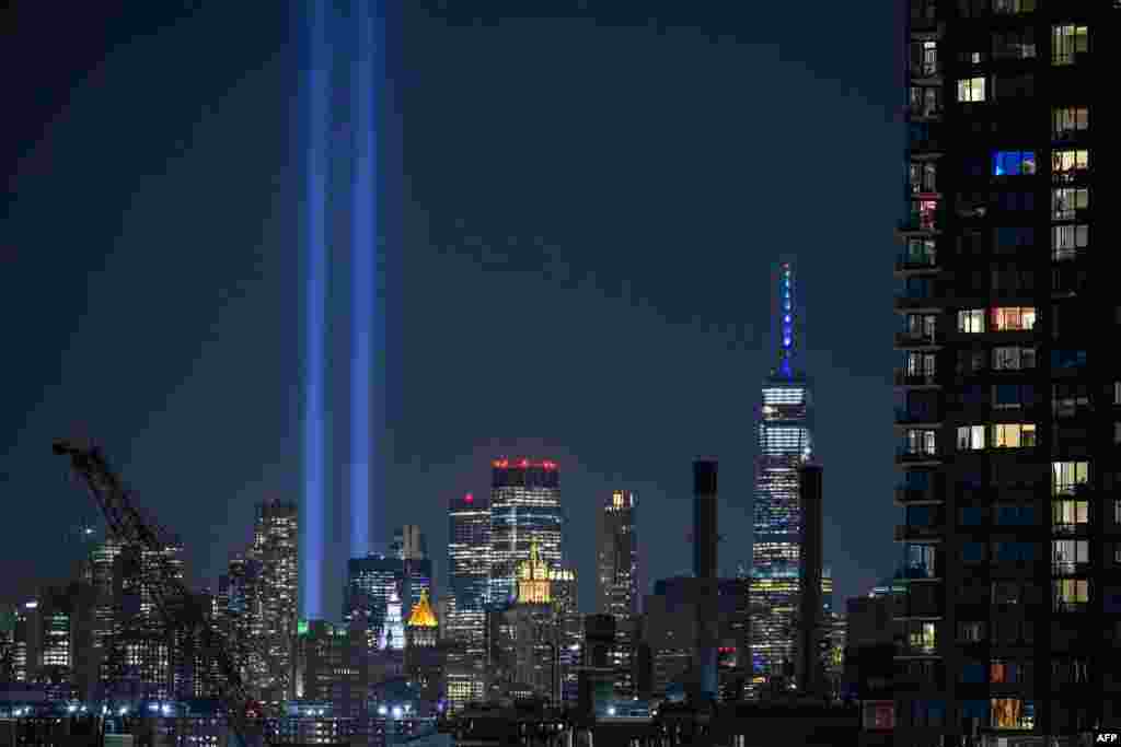 A general view shows the 'Tribute in Light' installation amid the Manhattan city skyline commemorating the 9/11 terrorist attacks, in New York, Sept. 10, 2022.