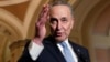Senate Minority Leader Chuck Schumer, D-N.Y., speaks to reporters ahead of President Donald Trump's first State of the Union address, at the Capitol in Washington, Jan. 30, 2018.