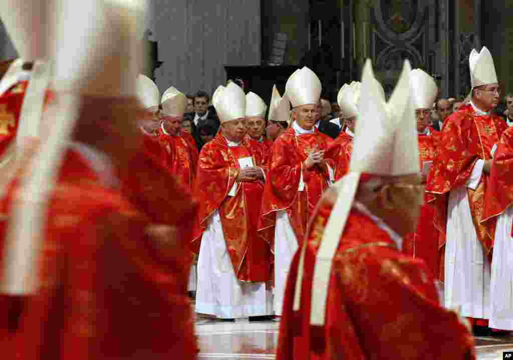 Cardinals attend a Mass for the election of a new pope inside St. Peter's Basilica, at the Vatican, March 12, 2013.
