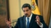 Venezuela's President Nicolas Maduro speaks during a press conference at Miraflore's Presidential Palace in Caracas, Venezuela, Feb. 8, 2019. 