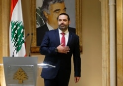 Lebanon's Prime Minister Saad Hariri gestures as he leaves after delivering his address in Beirut, Lebanon, Oct. 29, 2019.