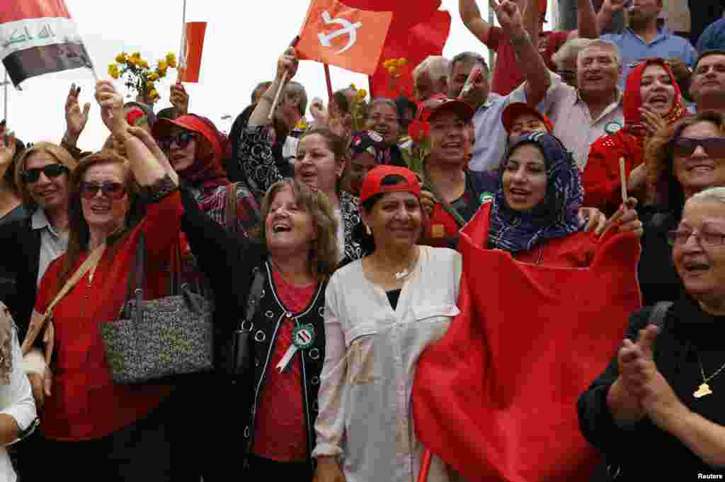 Supporters of the Iraqi Communist Party chant slogans during an International Worker's Day, or Labour Day, rally in Baghdad.