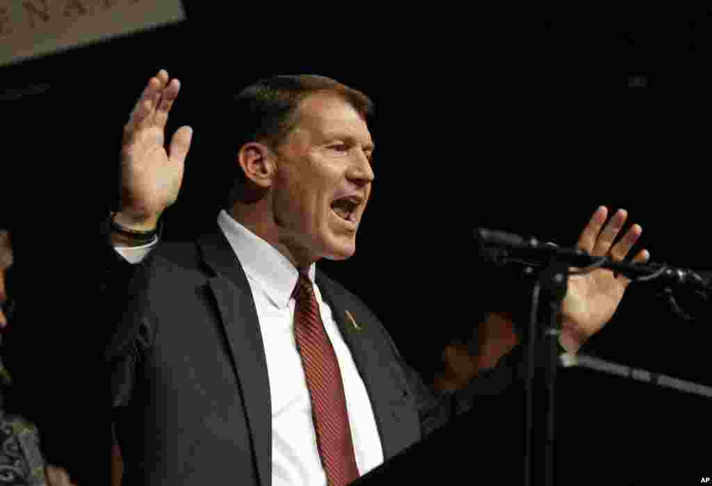 In South Dakota, Republican Mike Rounds celebrates his victory at an election night party in Sioux Falls on Nov. 4, 2014.