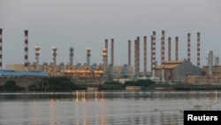 FILE - A general view of Abadan oil refinery in southwest Iran, is pictured from Iraqi side of Shatt al-Arab in Al-Faw south of Basra, Iraq September 21, 2019.