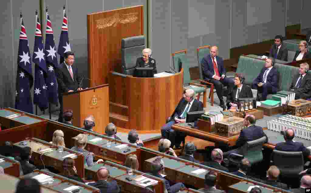 China’s President Xi Jinping delivers an address to parliament. Australia and China completed a free trade deal after nine years of negotiations, Canberra, Nov. 17, 2014.