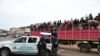 Un camion rempli de bergers a été arrêté avant d'arriver à Lagos à l'Ojodu-Berger à Lagos, le 4 mai 2020, en provenance de Zamfara et de l'État de Kano, l'épicentre du coronavirus au nord du Nigeria.