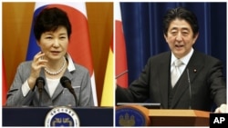 南韓總統朴槿惠（左）和日本首相安倍晉三（右）。