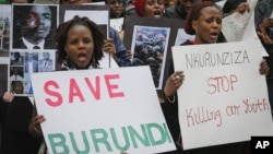 FILE - Burundi nationals from across the U.S. and Canada, along with supporters, demonstrate outside U.N. headquarters in New York, calling for an end to political atrocities and human rights violations unfolding in Burundi under the government of President Pierre Nkurunziza, April 26, 2016.