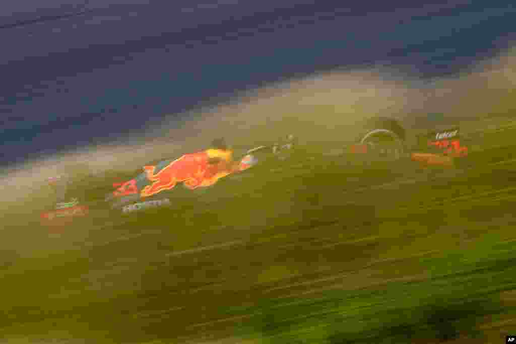 Red Bull driver Max Verstappen of the Netherlands steers his car during the first free practice ahead of Sunday's Formula One Dutch Grand Prix at the Zandvoort racetrack, Netherlands.
