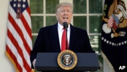 President Donald Trump speaks in the Rose Garden of the White House, Friday, Jan 25, 2019, in Washington. (AP Photo/Evan Vucci)