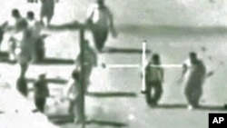 Presumed Apache helicopter's gun video reportedly showing the Reuters news photographer and his driver, among other men