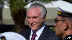 Brazil's President Michel Temer receives military honors during ceremony, in Brasilia, June 9, 2017. 