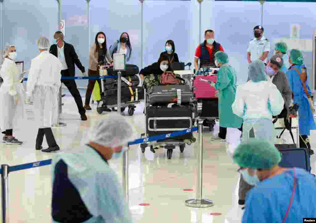 First group of foreign tourists arrive at Suvarnabhumi Airport during the first day of the country's reopening campaign - a part of the government's plan to jump start the pandemic-hit tourism sector - in Bangkok, Thailand, Nov. 1, 2021.