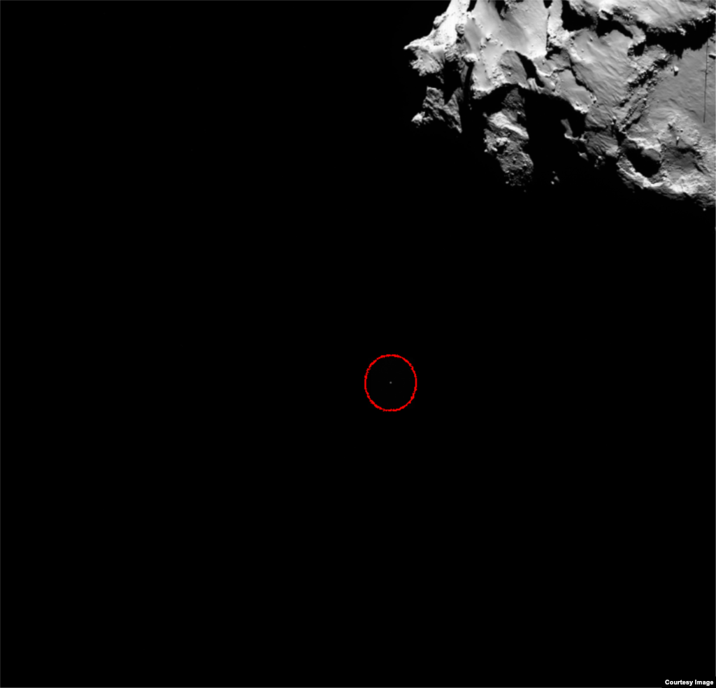 This OSIRIS wide-angle camera image shows the position of Rosetta’s lander Philae (circled) on Nov. 12, 2014. (Courtesy: European Space Agency, photo released Nov. 13, 2014)