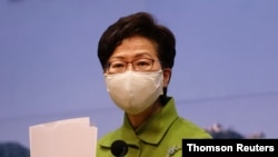 Hong Kong Chief Executive Carrie Lam attends a weekly news briefing in Hong Kong, Jan. 26, 2021.