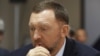 FILE - Oleg Deripaska attends an agreement-signing ceremony with the Krasnoyarsk region's government in Moscow, Russia, Dec. 12, 2017.