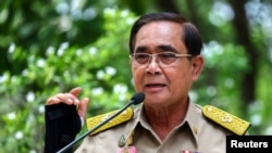 FILE - Thailand’s Prime Minister Prayuth Chan-ocha speaks at the Government House in Bangkok, Thailand, March 20, 2023.