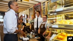 President Barack Obama is not an "average joe." He is seen here sampling coffee (a cup of joe) at Parkville Coffee in Parkville, Missouri, July 30, 2014,