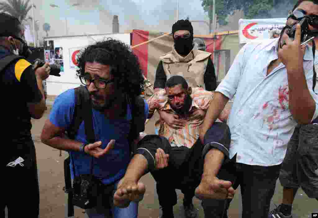 Məhəmməd Mursi tərəfradları - Qahirə Universitetinin yaxınlığı, Giza, 14 avqust, 2013