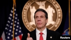 FILE - New York Governor Andrew Cuomo delivers remarks at a news conference in Manhattan borough of New York City, New York, March 2, 2020. 
