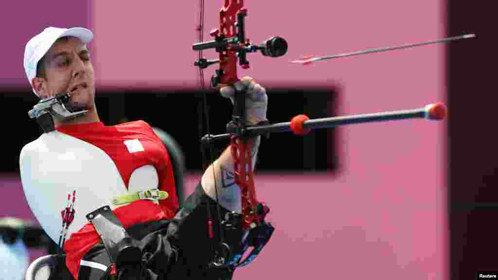 Piotr Van Montagu of Belgium competes in the men's archery individual compound open 1/8 elimination at the Tokyo 2020 Paralympic Games in Tokyo, Japan. 