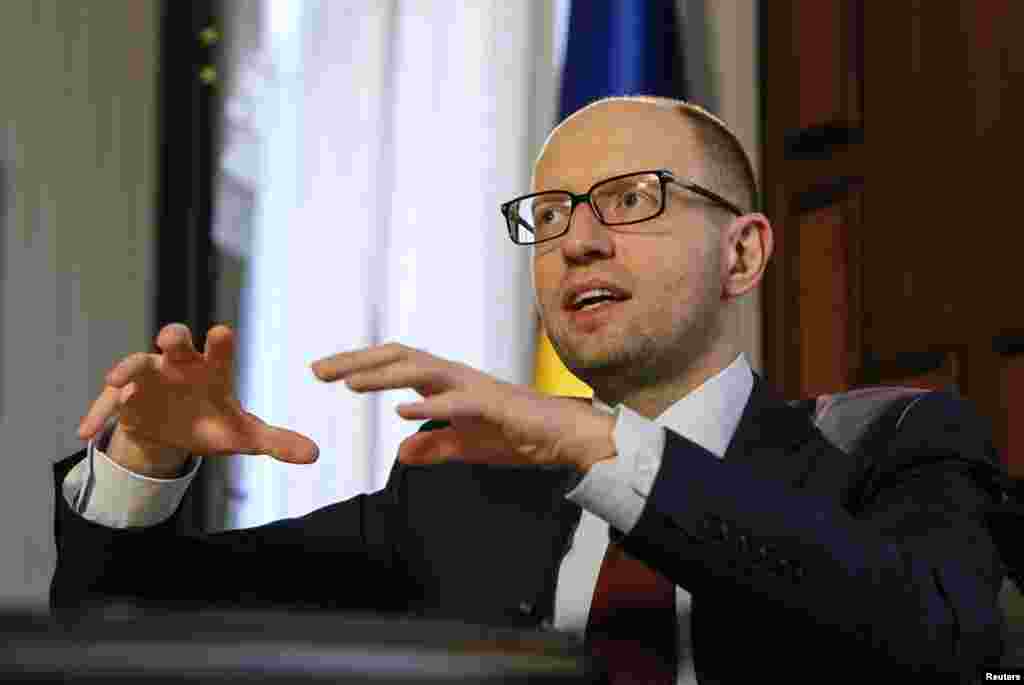 Ukrainian Prime Minister Arseniy Yatseniuk said during an interview with Reuters that the Kyiv government will stick to unpopular austerity measures "as the price of independence" as Russia steps up pressure on Ukraine to destabilize, Kyiv, April 3, 2014.