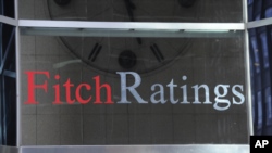 Esta foto muestra 1 State Street Plaza, sede de Fitch Ratings, el domingo 9 de octubre de 2011 en Nueva York. (Foto AP/Henny Ray Abrams)