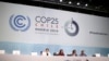 Tras dos semanas de negociaciones sobre la lucha contra el calentamiento global, los delegados aprobaron declaraciones pidiendo más ambición en la reducción de emisiones de gases de efecto invernadero y en la ayuda a países pobres afectados por el cambio climático. Foto AP