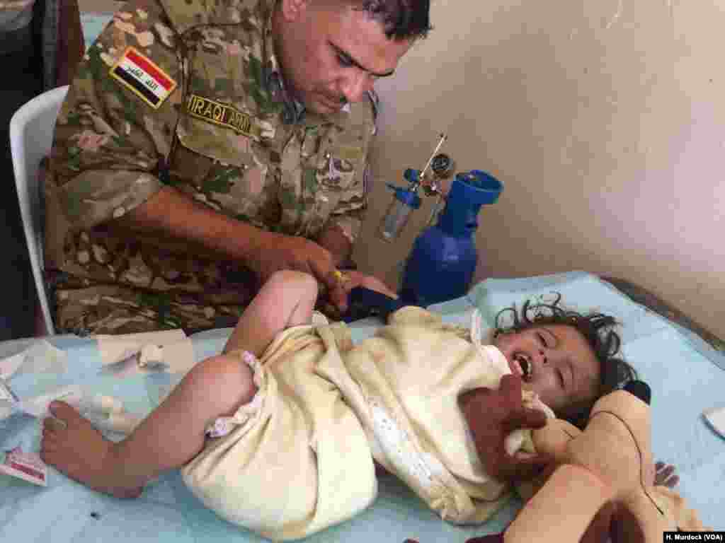 Doctors say children and the elderly are most injured by lack of good food and water in the chaos of the war in Iraq, but they are also most likely to be injured in the violence. As families flee, IS militants fire at them and people that run the slowest