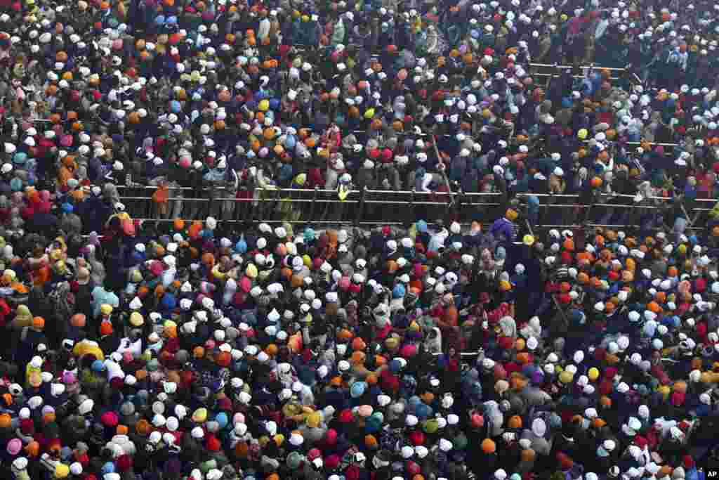 Sikh devotees gather to pay obeisance at the Golden Temple, the holiest of Sikh shrines, on New Year's Day in Amritsar, India, Jan. 1, 2022.