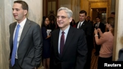FILE - US. Supreme Court nominee Judge Merrick Garland (R) walks after a breakfast with Senate Judiciary Committee Chair Senator Chuck Grassley (R-IA) on Capitol Hill Washington, April 12, 2016.