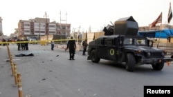 A military vehicle of Iraqi security forces is seen at the site of a suicide bomb attack in Kirkuk, Nov. 5, 2017. 