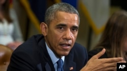 FILE - President Barack Obama delivers remarks during a meeting with people that wrote him letters explaining how they benefited from the Affordable Care Act in the Roosevelt Room of the White House in Washington, Feb. 3, 2015.