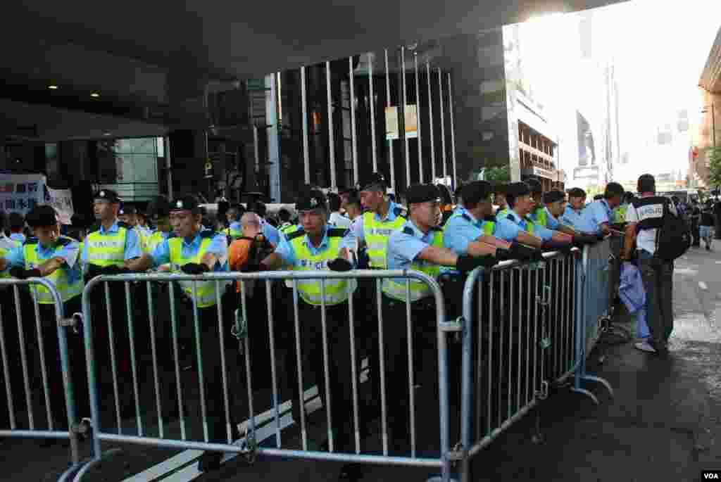 Police expand their block area.