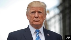 Presiden Amerika Donald Trump dalam konferensi pers di Bedminster, New Jersey hari Jumat (11/8). 