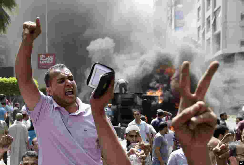 Məhəmməd Mursi tərəfdarları ilə təhlükəsizlik qüvvələri arasında qarşıdurma - Qahirə, 14 avqust, 2013