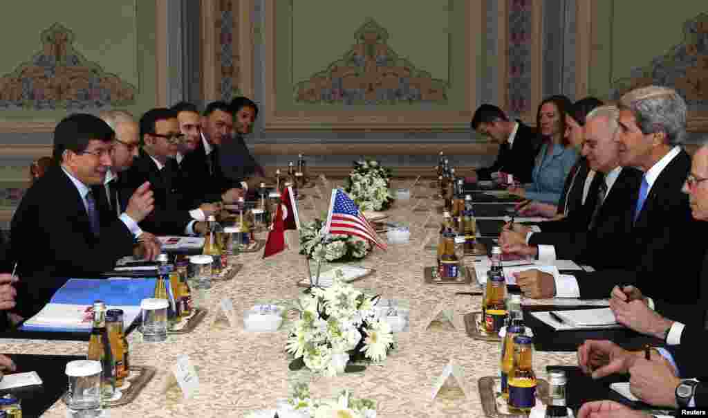 U.S. Secretary of State John Kerry meets with Turkey's Foreign Minister Ahmet Davutoglu at Ciragan Palace in Istanbul, April 7, 2013.