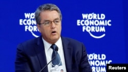 FILE - Roberto Azevedo, director-general of the World Trade Organization (WTO), attends the World Economic Forum annual meeting in Davos, Switzerland, Jan. 24, 2018.