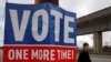 Un cartel insta a los residentes a votar en la segunda vuelta de las elecciones para los dos escaños del Senado de EE. UU. de Georgia, en Atlanta, Georgia, EE. UU., el 3 de enero de 2021.